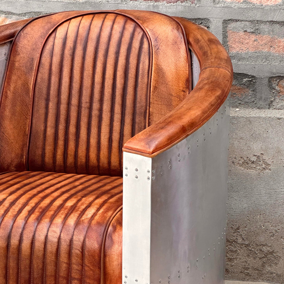 Top Gun Aviator Chair (AV-01) by Rising Tide Design Co. viewed from an offset angle